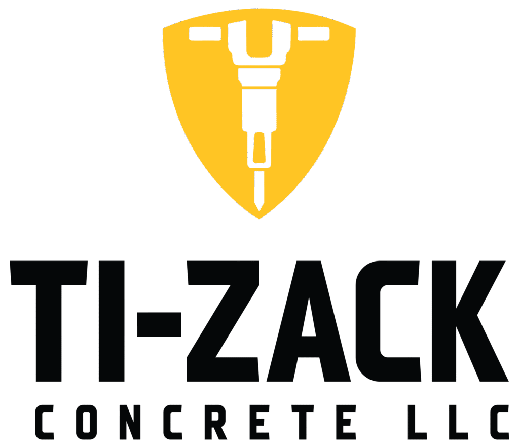 Ti-Zack Concrete LLC logo. Features a yellow shield with a jackhammer, and the company name in bold black text.